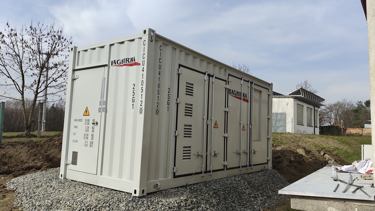 Installation-stage view of the container exterior and prepared site.